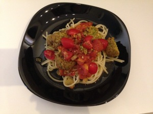 Spaghetti with tomato sauce and falafel